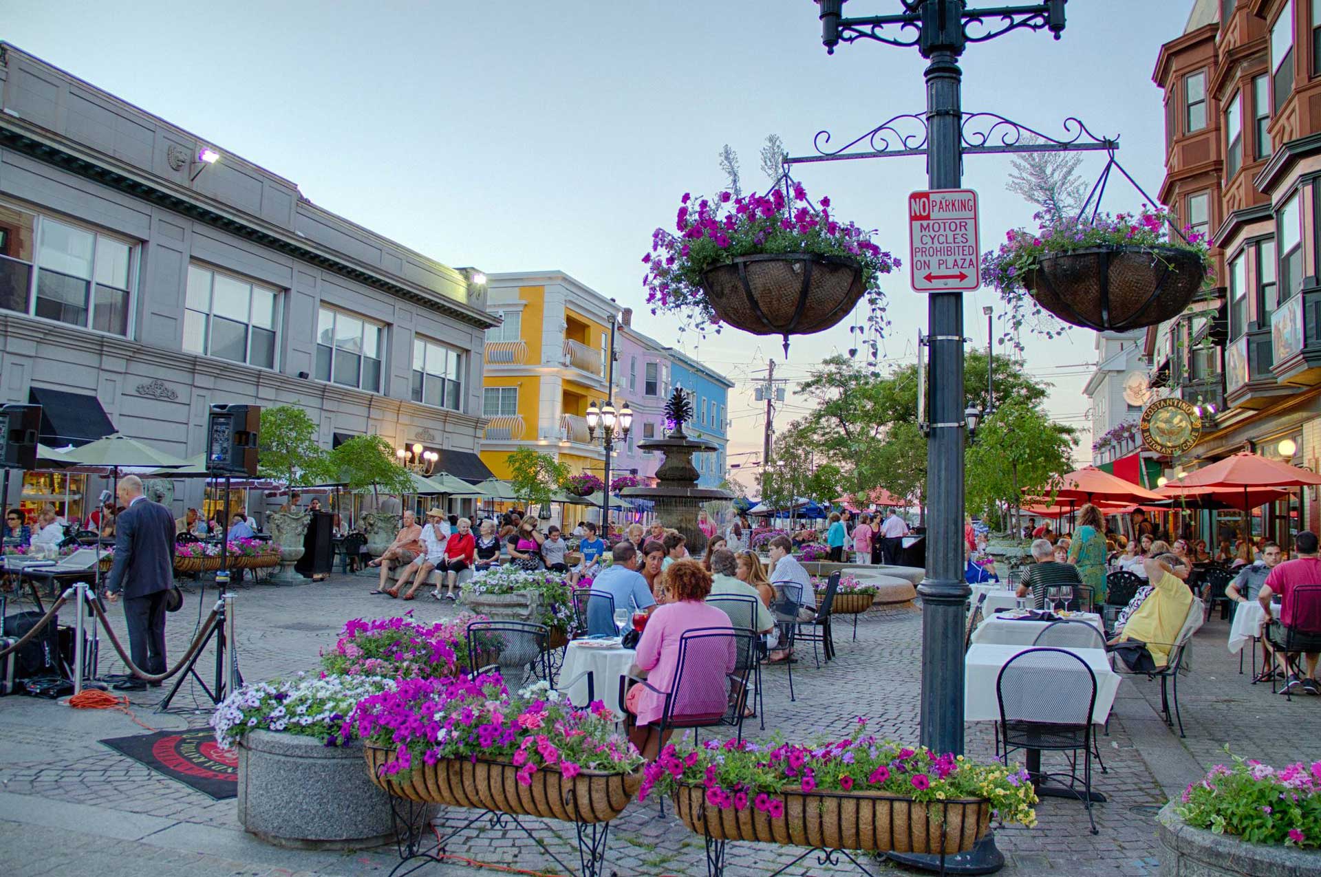 Gathering of people at the DePasquale Square - The Heart of Little-Italy in Providence, Rhode Island.