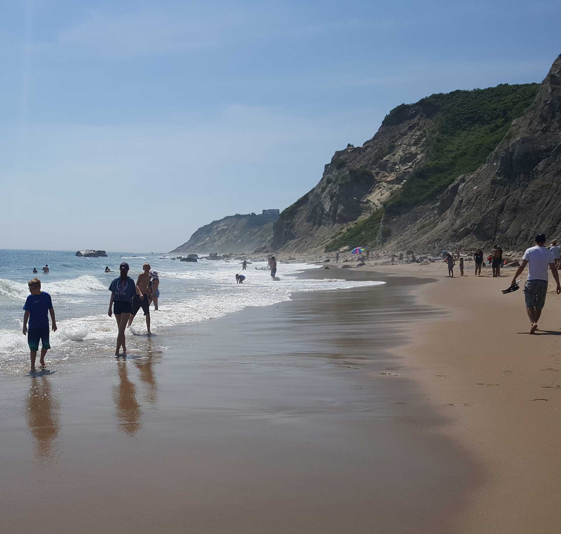 People doing random things at the Mohegan Bluffs Beach, Block Island, RI.