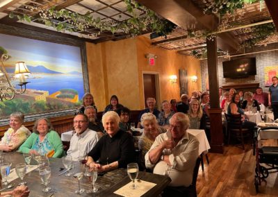 Group of tourists waiting for fine dining experience - an activity included in the An Evening in the City Tour.