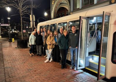 Group picture of tourists after an evening of food and fun - an activity included in the Dine Around Providence Tour.