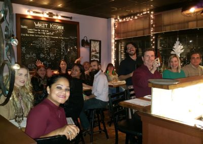 Tourists enjoying their dinner at The Wurst Kitchen - an experience included in the Dine around Providence Tour.