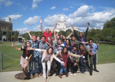 Group picture with Rhode Island State House as Backdrop - an experience included in the Discover Providence Tour.