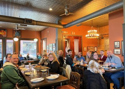 Group of tourist enjoying their lunch - an activity included in the Providence's Very Delicious Lunch Tour.