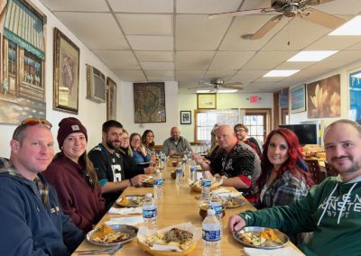 Group of tourists enjoying a sumptuous snacks - an experience included in the Providences Very Delicious Lunch Tour.