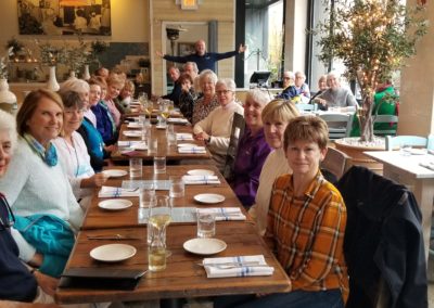 Group of tourists waiting for their lunch at the Kleos Restaurant - included in the Providence's Very Delicious Lunch Tour.