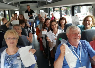 Group of tourists inside the Experience RI aircon tour - an experience included in the The Italian Experience Tour.