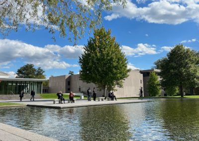 View of the Clark Art Institute by the pond - an experience included in the Beauty of the Berkshires Tour.