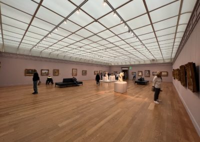 Interior of The Clark Institute filled with paintings and more - an experience included in the Beauty of the Berkshires Tour.